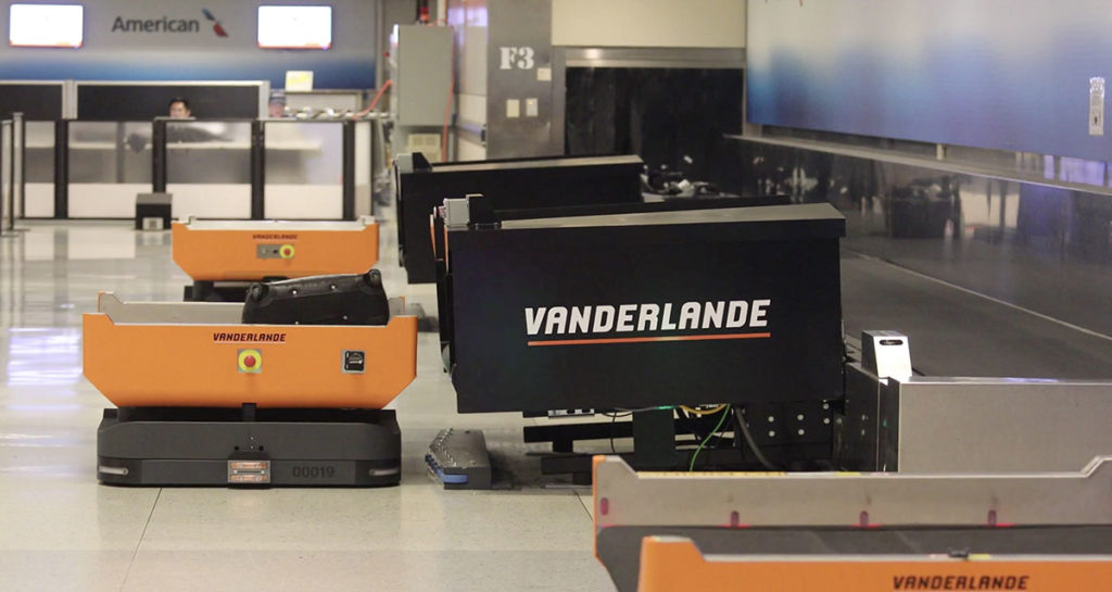 Robot Baggage Handlers System Fleet DFW Airport - YellRobot